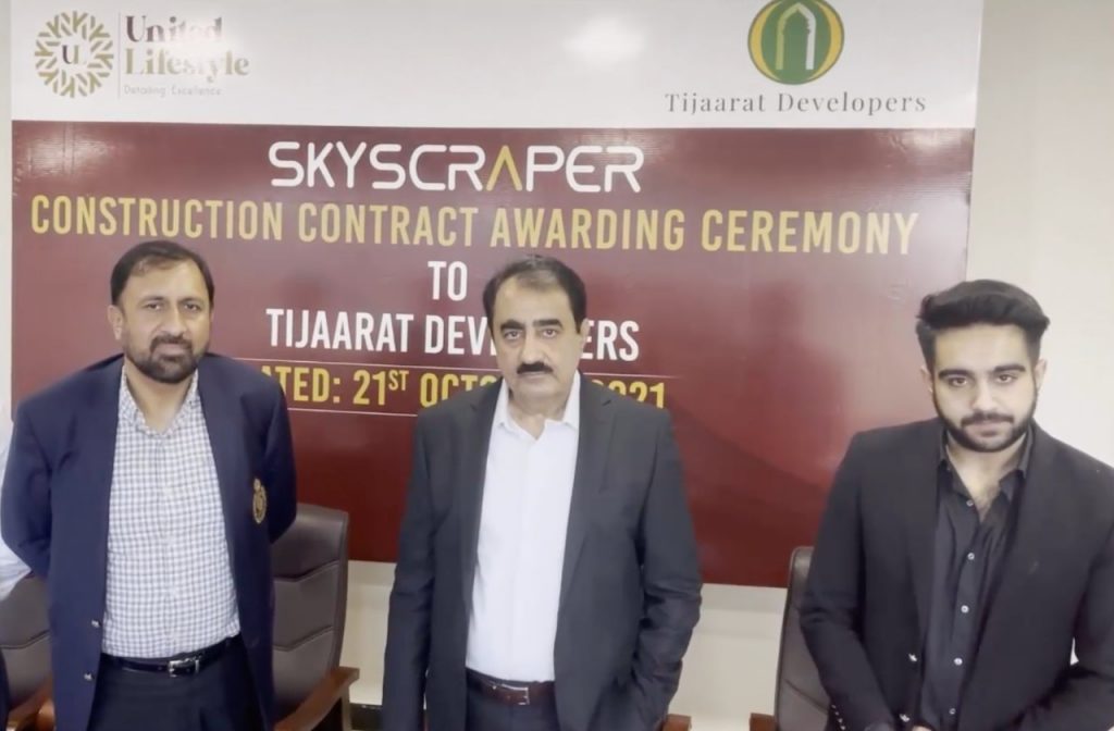 skyscraper construction contract ceremony